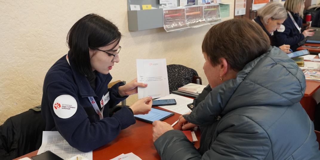 Woman giving help in Ukraine