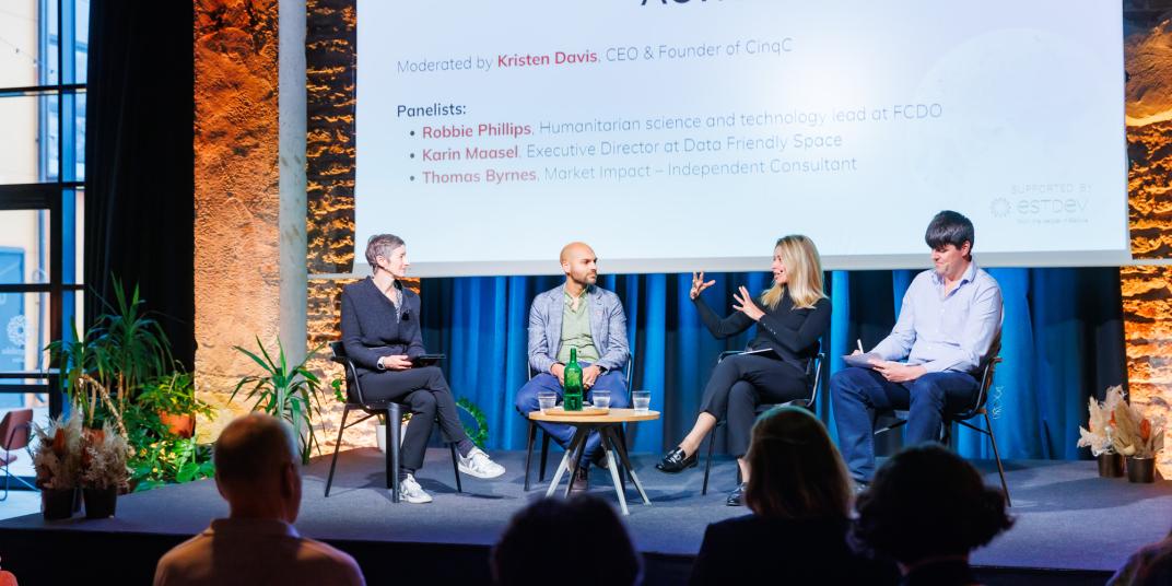People sitting on a stage 